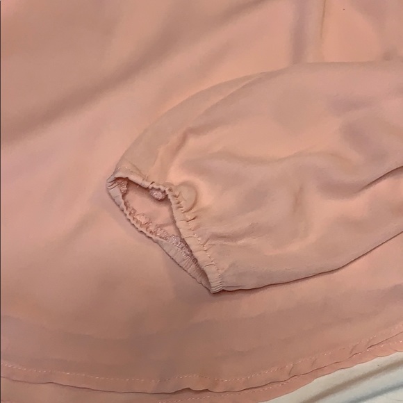 Peach colored cold shoulder top. - Picture 2 of 4